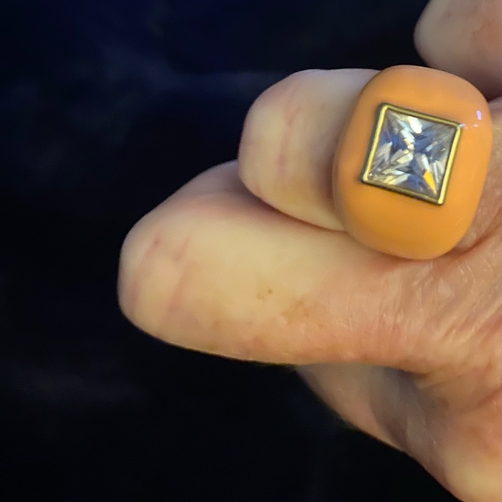 6 3/4 ring by coach . Peach color, perfect for this time of year.